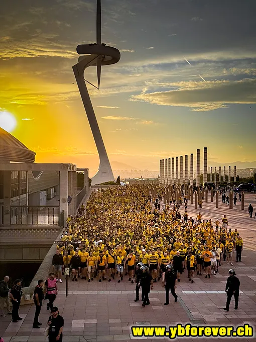 Young Boys supporters walking together toward the stadium in Barcelona