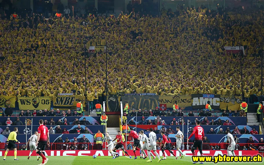 Young Boys supporters filling the away section at Old Trafford during a match against Manchester United